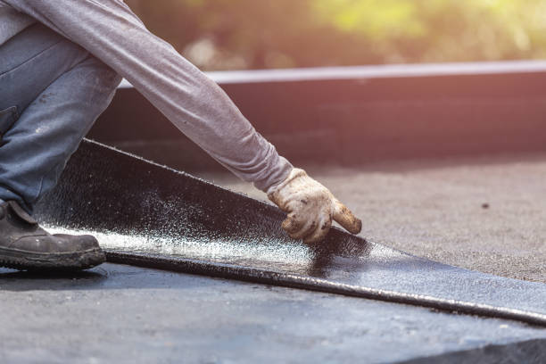 Professional Basement Waterproofing technician working in Lynchburg, TN